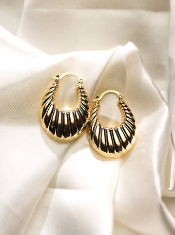 Gold plated textured oval hoop earrings